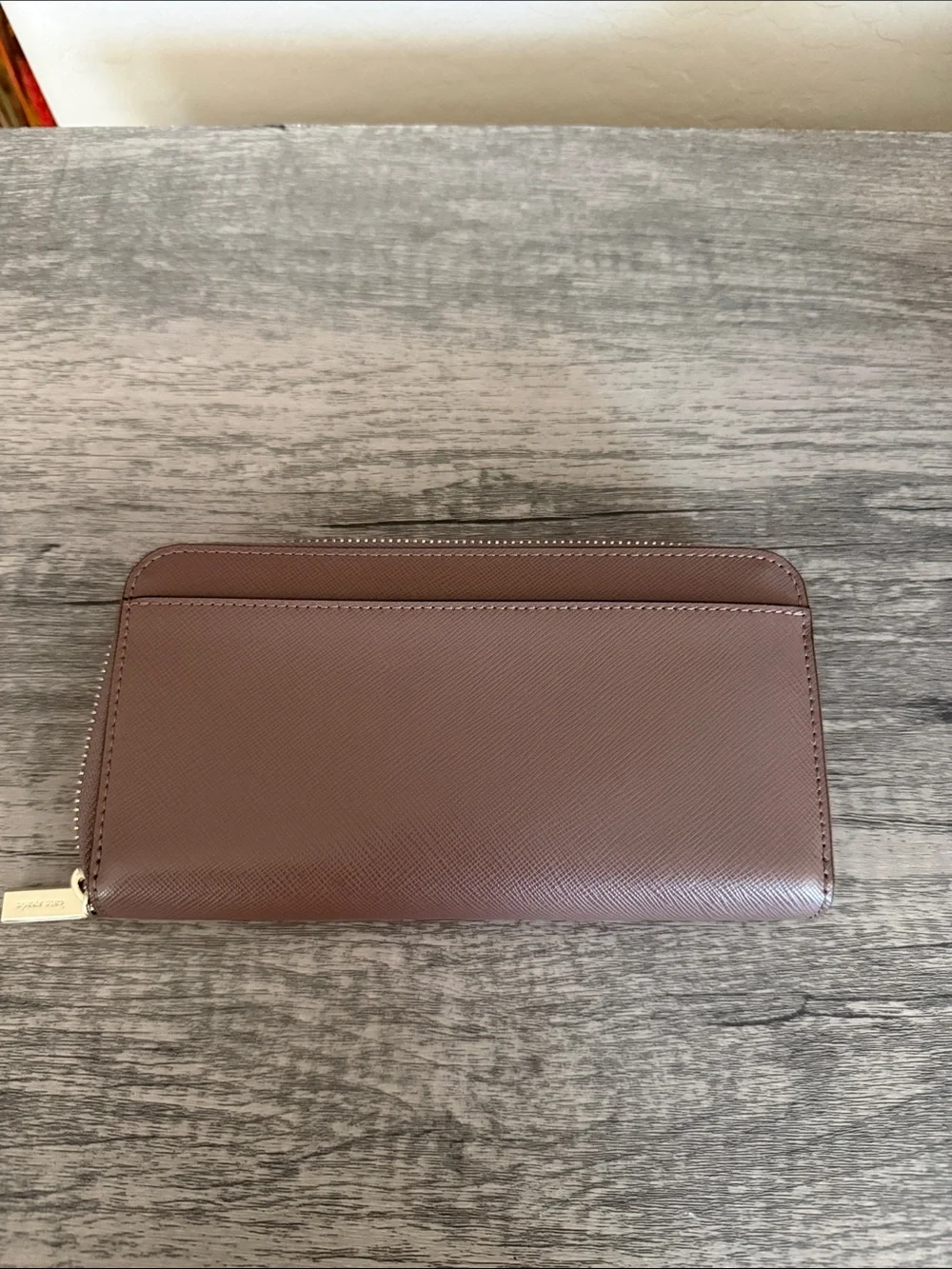 kate spade brown zip-around saffiano leather wallet with gold logo